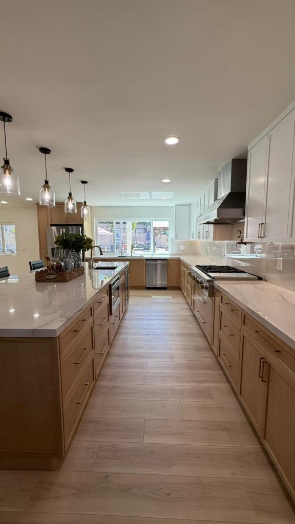 Flawless flooring transitions in a remodeled space