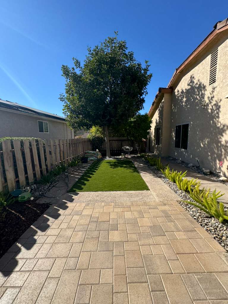 Modern Backyard Oasis: Premium Turf Install with Pergola-Covered Lounge Area